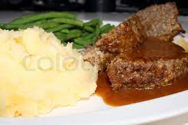 Meatloaf, mashed potatoes, green beans and gravy | Stock image | Colourbox